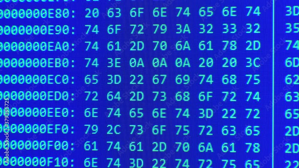 Close up on computer screen binary code on blue background. Close up on computer screen binary code on blue background.