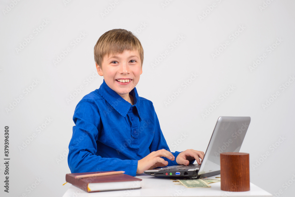little businessman - Young smart pretty boy looks. Notepad and N little businessman - Young smart pretty boy looks. Notepad and N