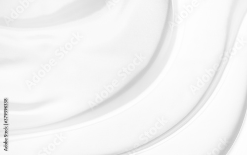 White gray satin texture that is white silver fabric silk background with beautiful soft blur pattern natural.