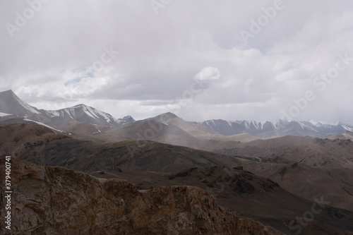 landscape with clouds and snow in tanglang la leh ladakh