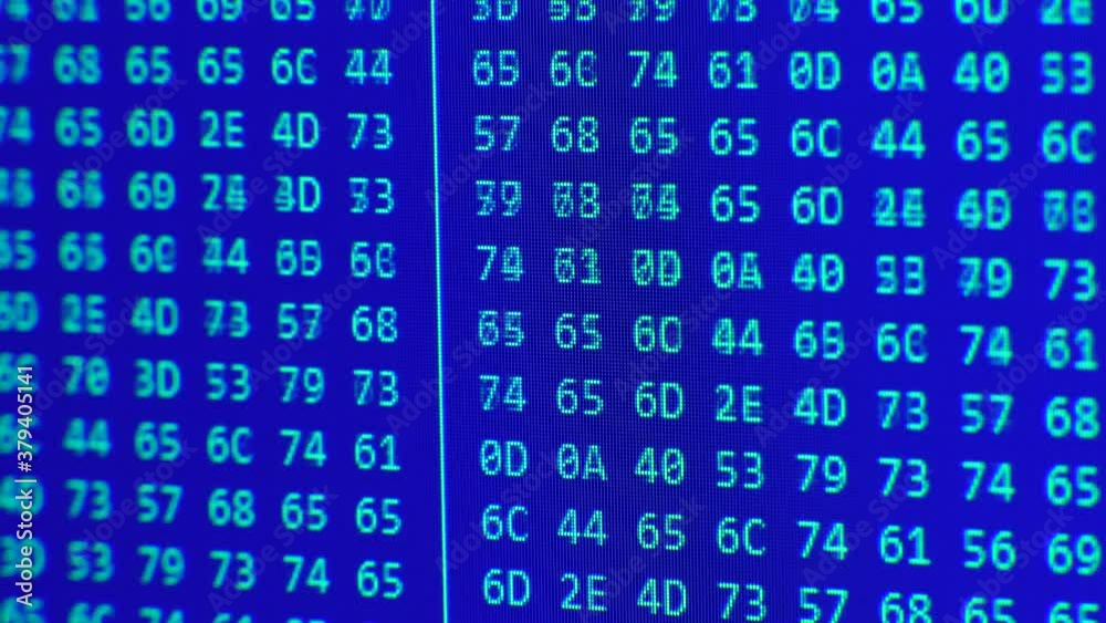 Close up on computer screen binary code on blue background. Close up on computer screen binary code on blue background.
