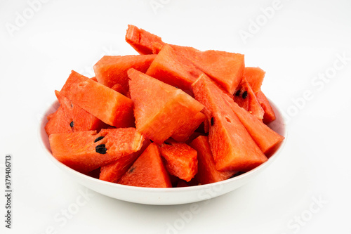 closeup of some pieces of refreshing watermelon on a white background, Healthy eating. juicy and ripe watermelons.