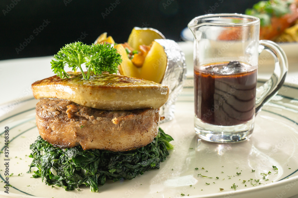 grilled foie gras on tender beef eat with spinach