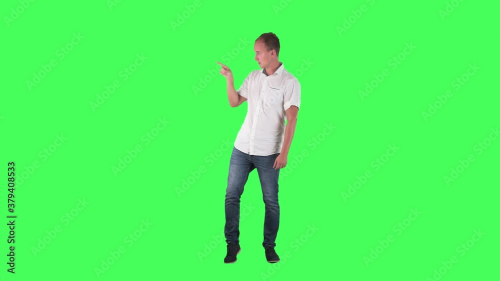 Business man pointing finger showing empty copy space. Full body on green screen. Business man pointing finger showing empty copy space. Full body on green screen.