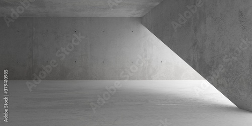 Abstract empty, modern concrete room with indirect lighting and diagonal wall and rough floor - industrial interior background template