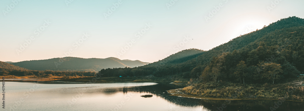 Panorama landscape Beautiful reservoir with mountains and clouds in the morning. Fresh air, Make Tip Reservoir, Lamphun Province, in  Thailand