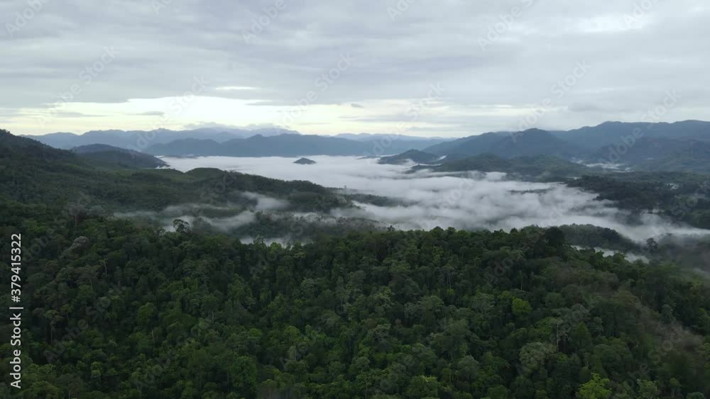Epic morning Flight over Beautiful mountains and clouds at sunrise on Mountains in Thailand. Aerial view of nice rainy morning in Mountains. Epic morning Flight over Beautiful mountains and clouds at sunrise on Mountains in Thailand. Aerial view of nice rainy morning in Mountains.