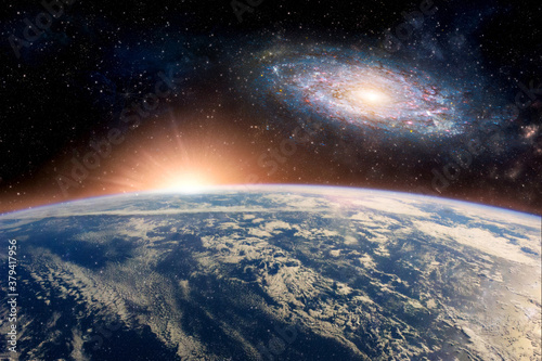 Andromeda with the earth deep space fantasy background image Elements of this image furnished by NASA