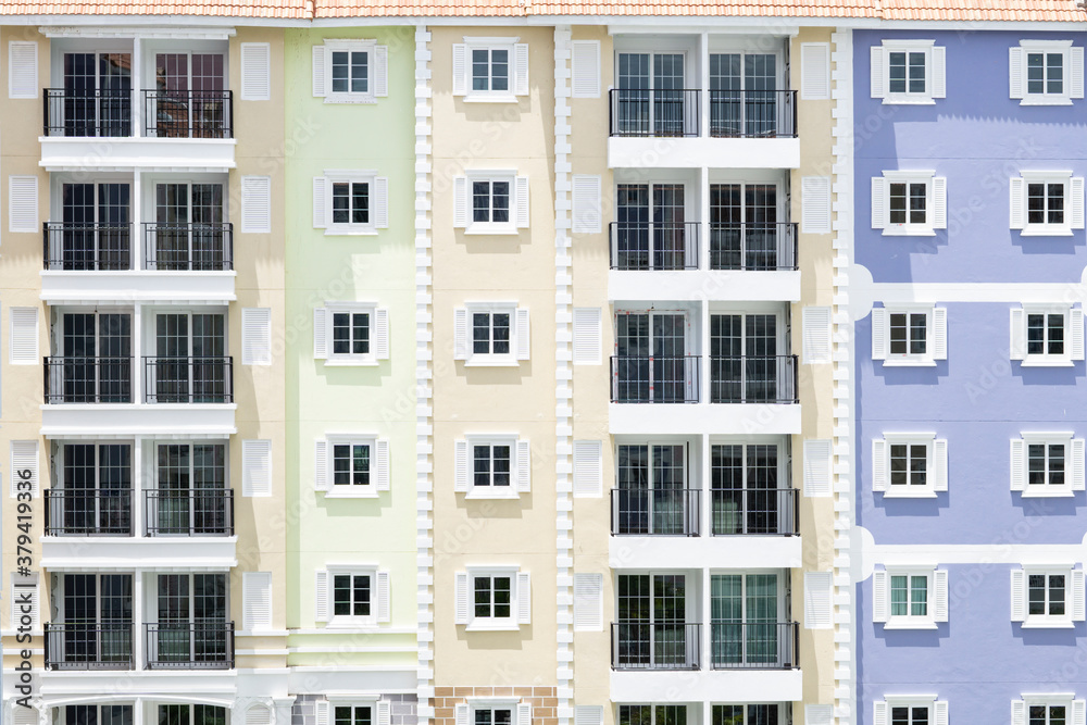 Windows on colorful building.