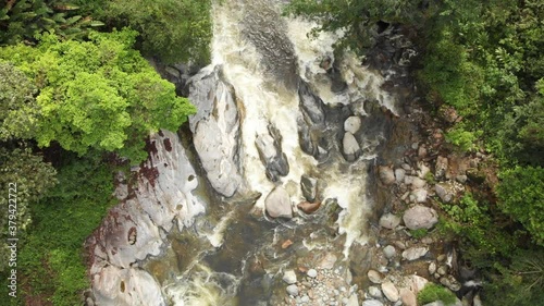 Top Down Aerial View of Buritaca River on Lost City Hiking Trail, Colombia photo