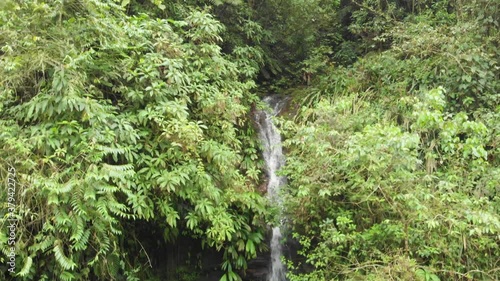 Aerial View of Waterfall in Rainforest of Sierra Nevada de Santa Marta, Colombia photo