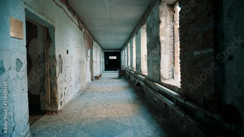 Destroyed school in Beslan after the terrorist attack. Old empty school corridors photo