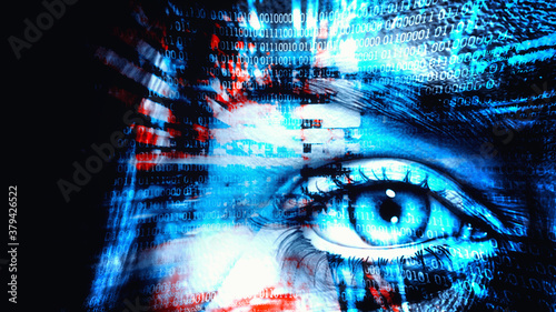 Digital composite of Eye scanning a futuristic interface
