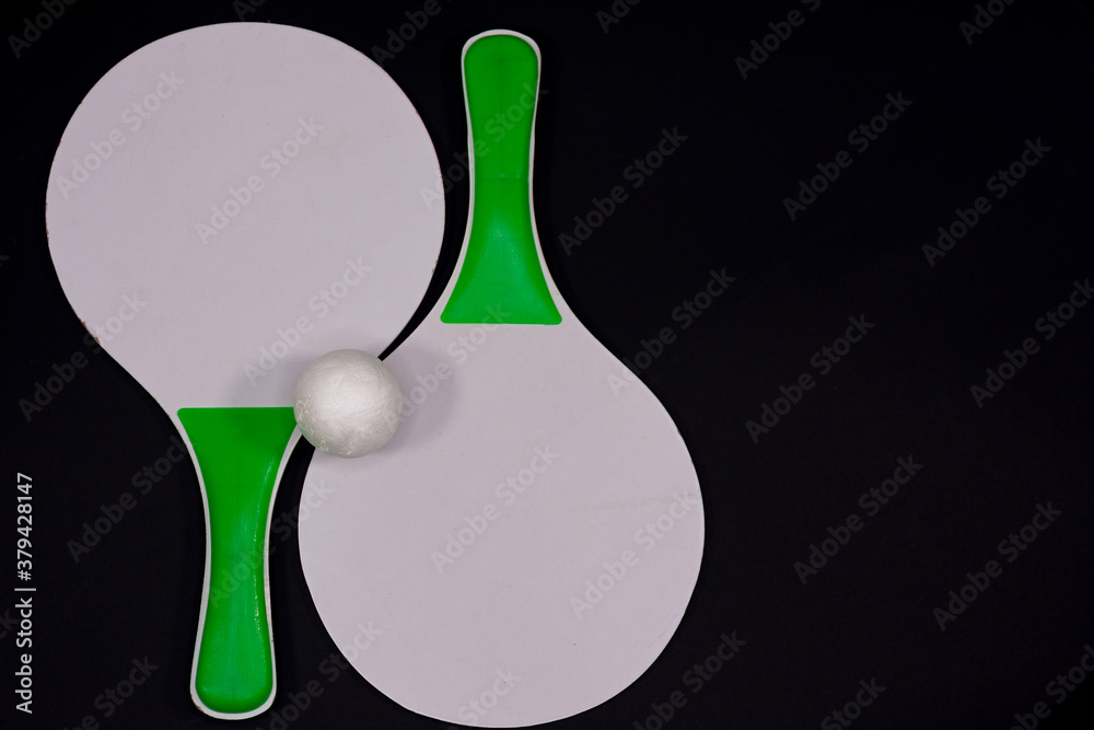 Close up of beach tennis rackets with space for writing. Isolated on background