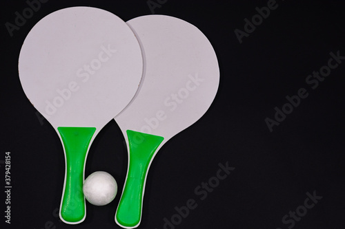 Close up of beach tennis rackets with space for writing. Isolated on background