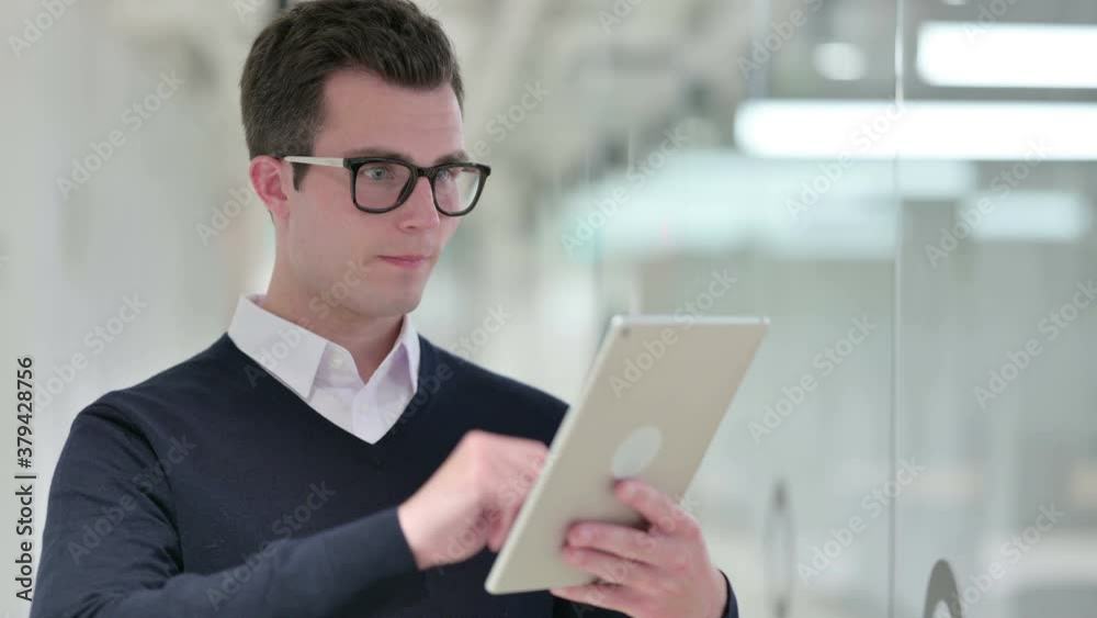 Young Businessman using Digital Tablet, Email Young Businessman using Digital Tablet, Email