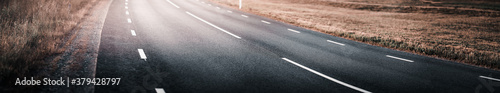 Asphalt road and dividing lines on the street