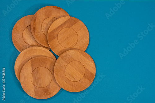 Obraz na płótnie Bamboo saucers arranged in various order, with space to insert letters of text w salonie