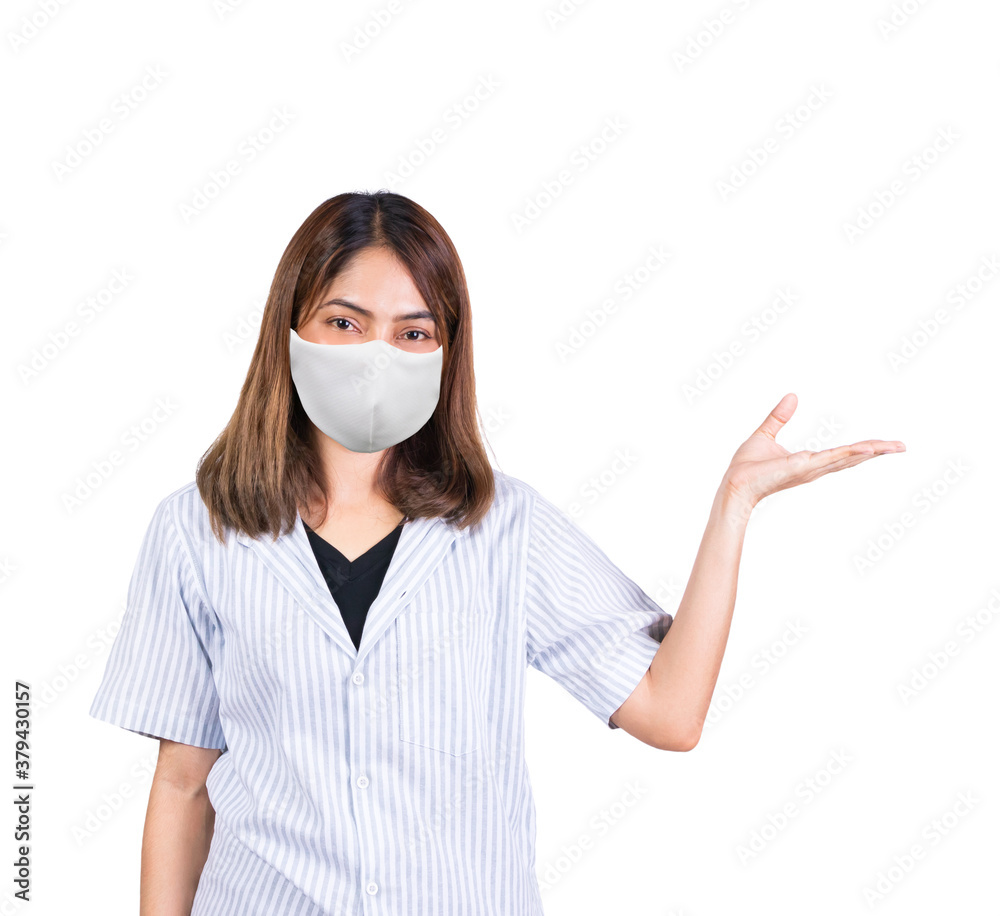 woman wearing fabric mask showing open hand for product or something on white background woman wearing fabric mask showing open hand for product or something on white background