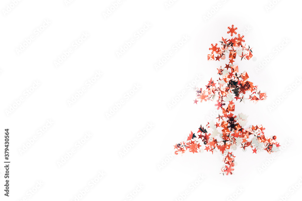 Shiny Christmas tree isolate. Figure of a Christmas tree on a white background of shiny multi-colored confetti. Happy new year and merry Christmas. Shiny Christmas tree isolate. Figure of a Christmas tree on a white background of shiny multi-colored confetti. Happy new year and merry Christmas.