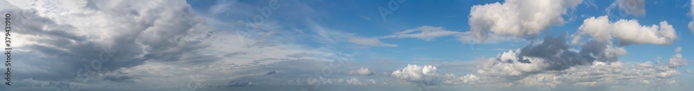 Fototapeta premium Fantastic clouds against blue sky, panorama