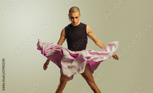 Photo Man in flowing skirt