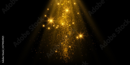 Transparent golden light effect. Magical sparkles isolated on black background.