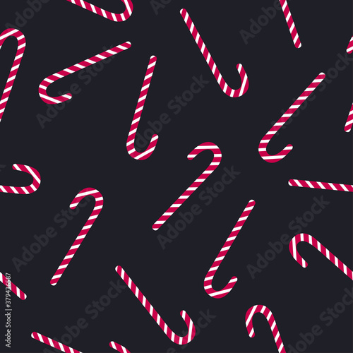 Candy cane Vector seamless pattern in flat design Traditional Christmas striped red-white candies on dark background