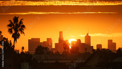 Downtown Los Angeles Sunrise over city buildings silhouettes.