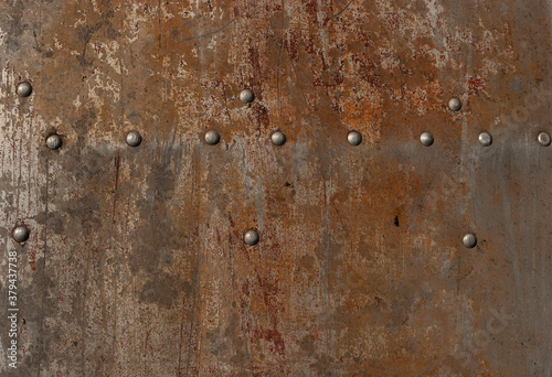The background is made of aluminum sheet with rivets. 2