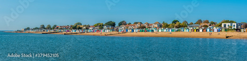 A panorama view across the beach at West Mersea, UK in the summertime