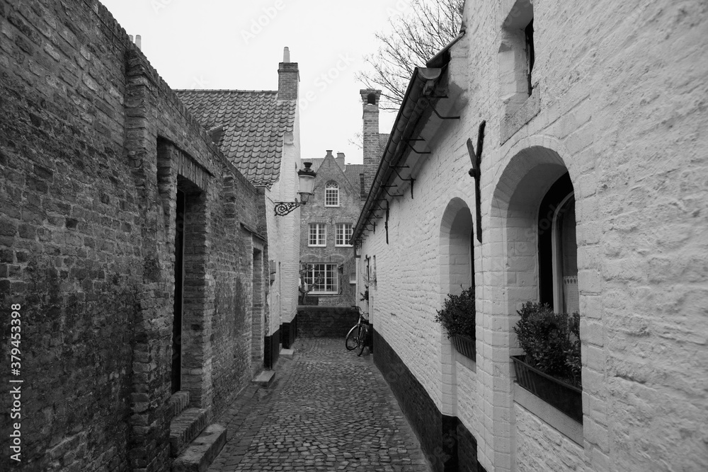 An ancient cobbled lane off Moerstraat, showing former almshouse 