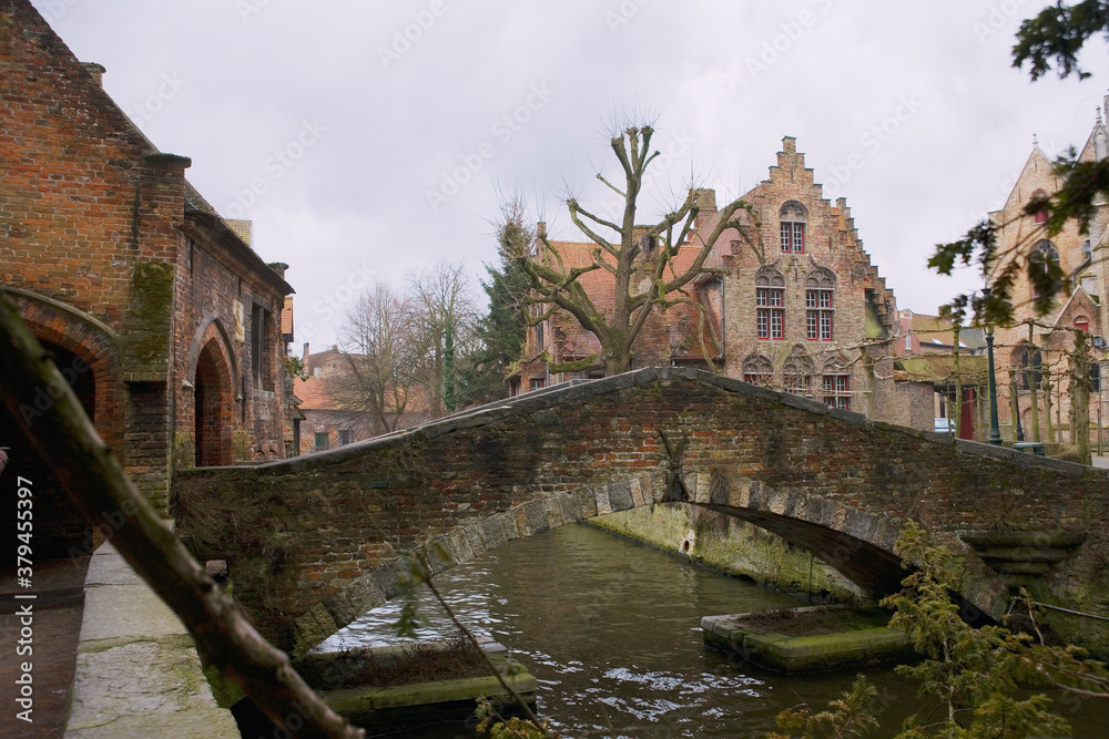 Boniface Bridge (Bonifatiusbrug): a narrow, pretty little old bridge over the Bakkerei canal at the corner of Arents Park (Hof Arents), Bruges, Belgium