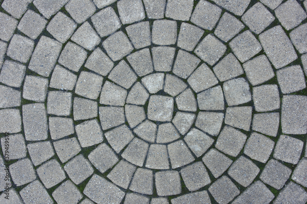 Textured stone background in gray with speckles.