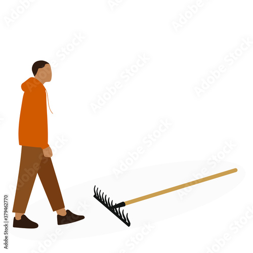 
The male character is walking, and in front of him are a rake