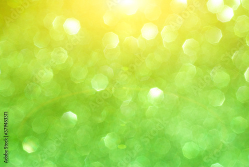 abstract green bokeh background from glitter