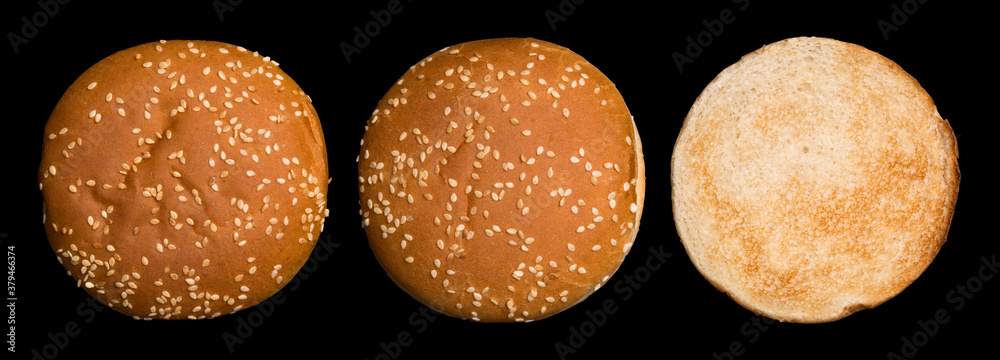 Set of burger bun isolated on black background. View from above