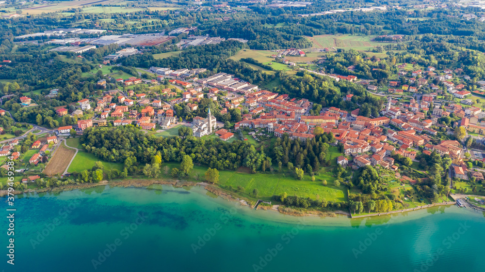 Aerial view from the drone of the landscape of a small town on the shores of lake Como, Italy. Aerial view from the drone of the landscape of a small town on the shores of lake Como, Italy.