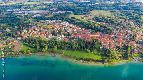 Aerial view from the drone of the landscape of a small town on the shores of lake Como, Italy. © frolova_elena