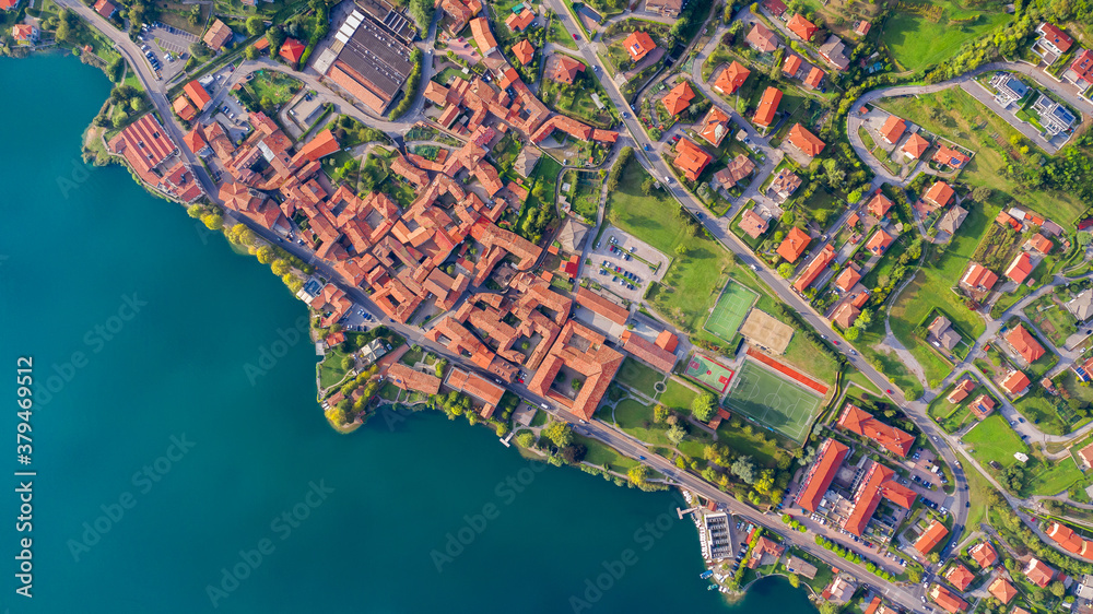 Obraz premium Aerial view from the drone of the landscape of a small town on the shores of lake Como, Italy.