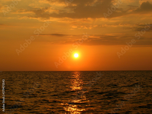 sunset over the sea © Angela