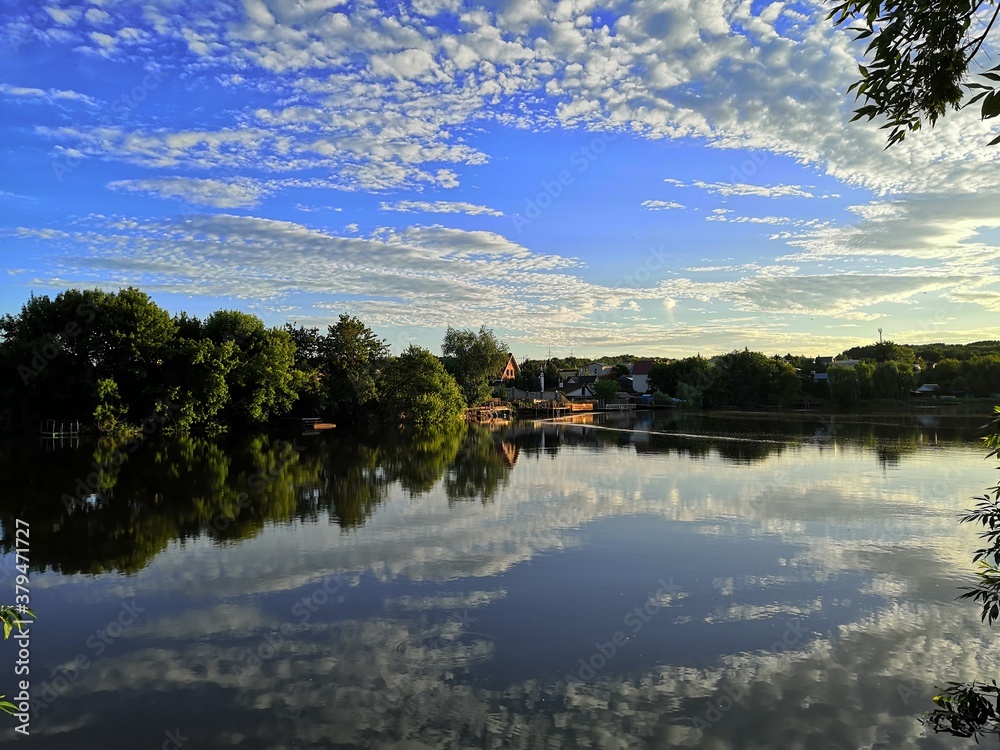 Obraz premium sunset over the river