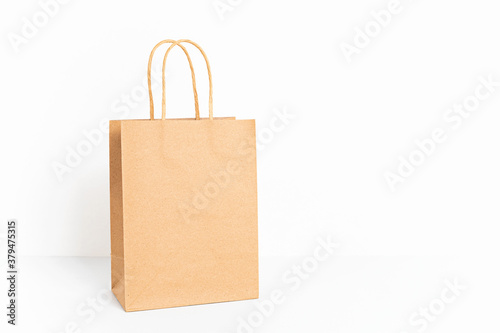 Mockup with craft paper bag. Template for small business branding, gifts, presents. Copy space