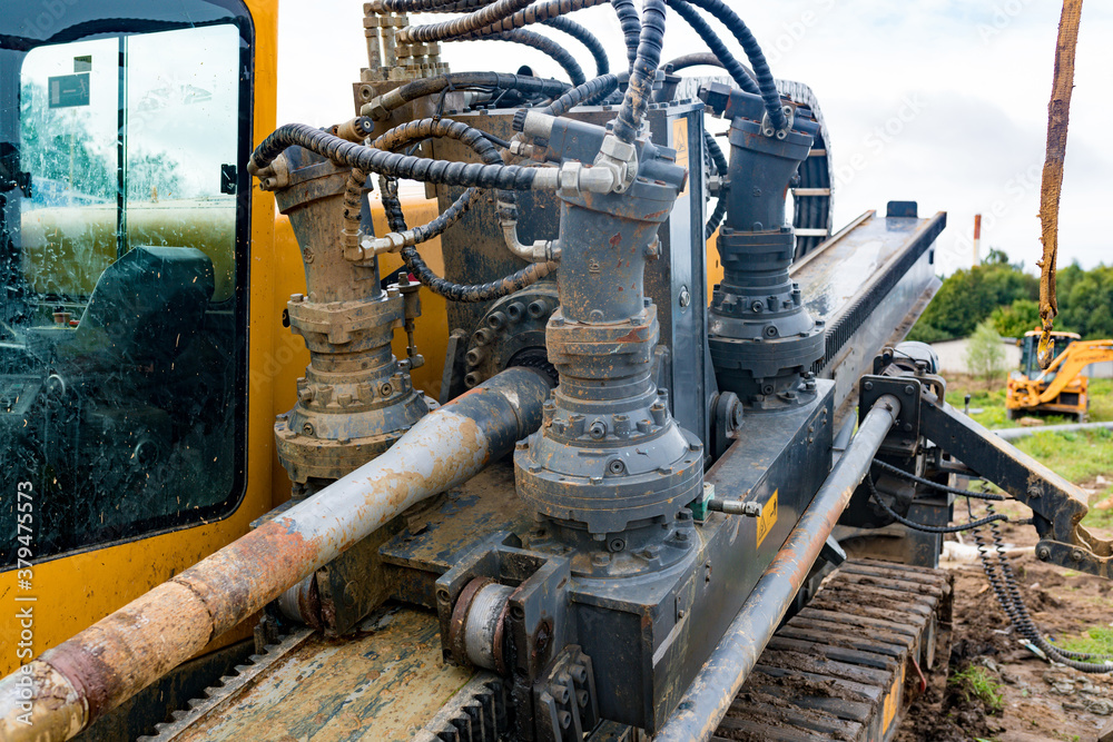 Horizontal directional drilling technology closeup. Drilling machine ...