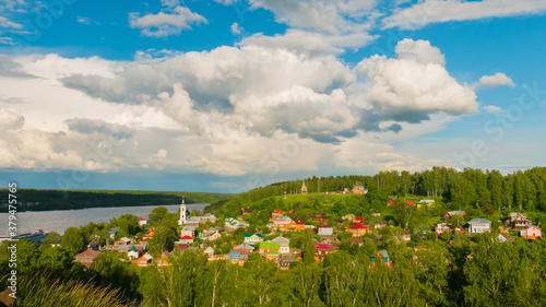 Village near river - rural landscape - russian historical town Plyos on the Volga River