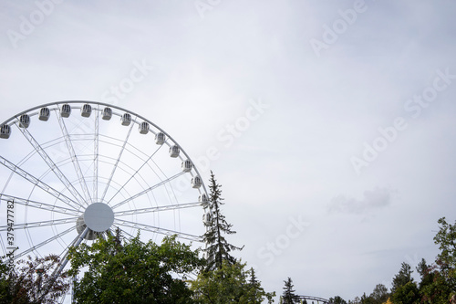 Ferries wheel in the park over sky © gargantiopa