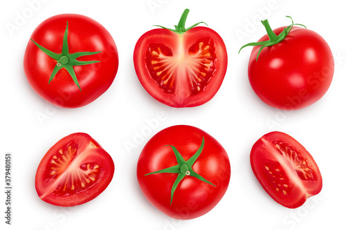 Tomato with half and slices isolated on white background. Clipping path and full depth of field. Top view. Flat lay