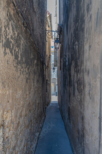 Dole, France - 08 31 2020: Small alley in the city © Franck Legros