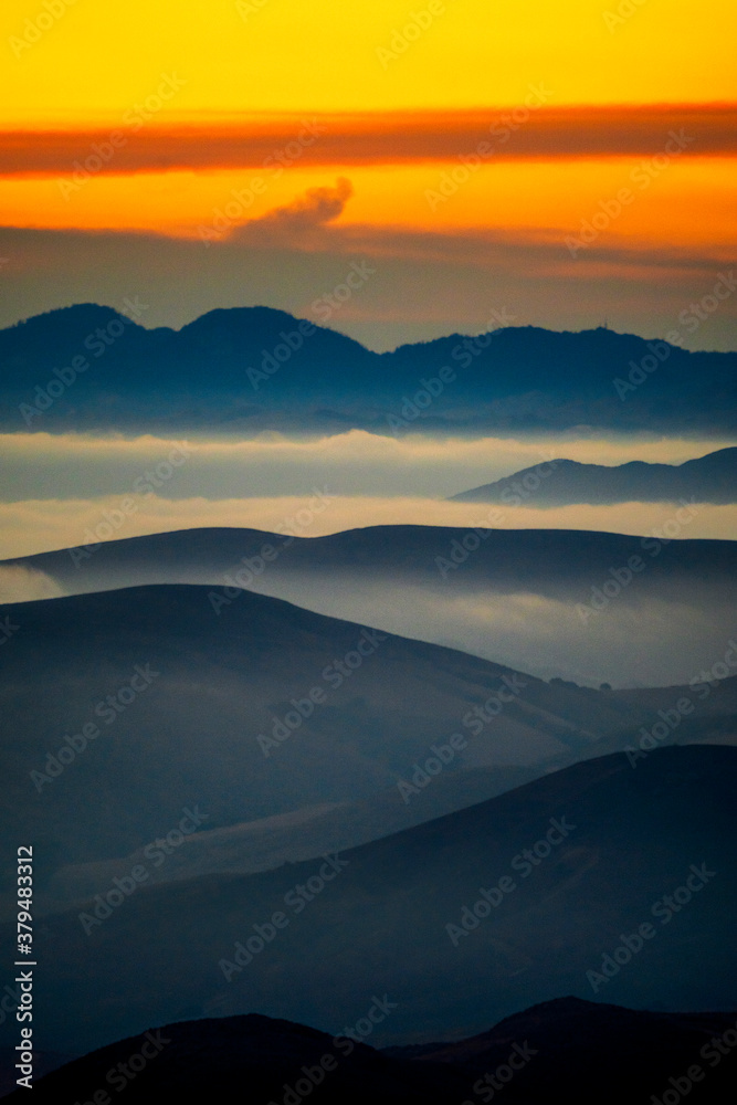 Silhouetted Hills at Sunset, Clouds, Fog