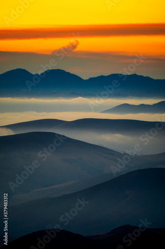 Silhouetted Hills at Sunset, Clouds, Fog